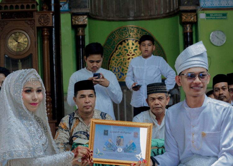 Dua Dunia Bersatu: Pendiri Tabweb.id Muhammad Al Farizi Resmi Menikah dengan Sang Guru Inspiratif, Lioni Albania
